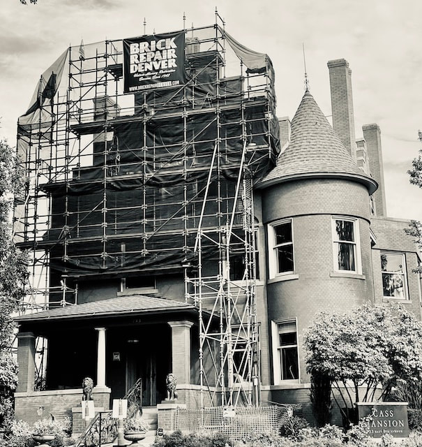 Historic masonry restoration, brick repair, brick cleaning and sandstone restoration on historical building in Denver Colorado Cass Mansion